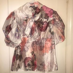 Floral print top size 2xl I bought it way too big